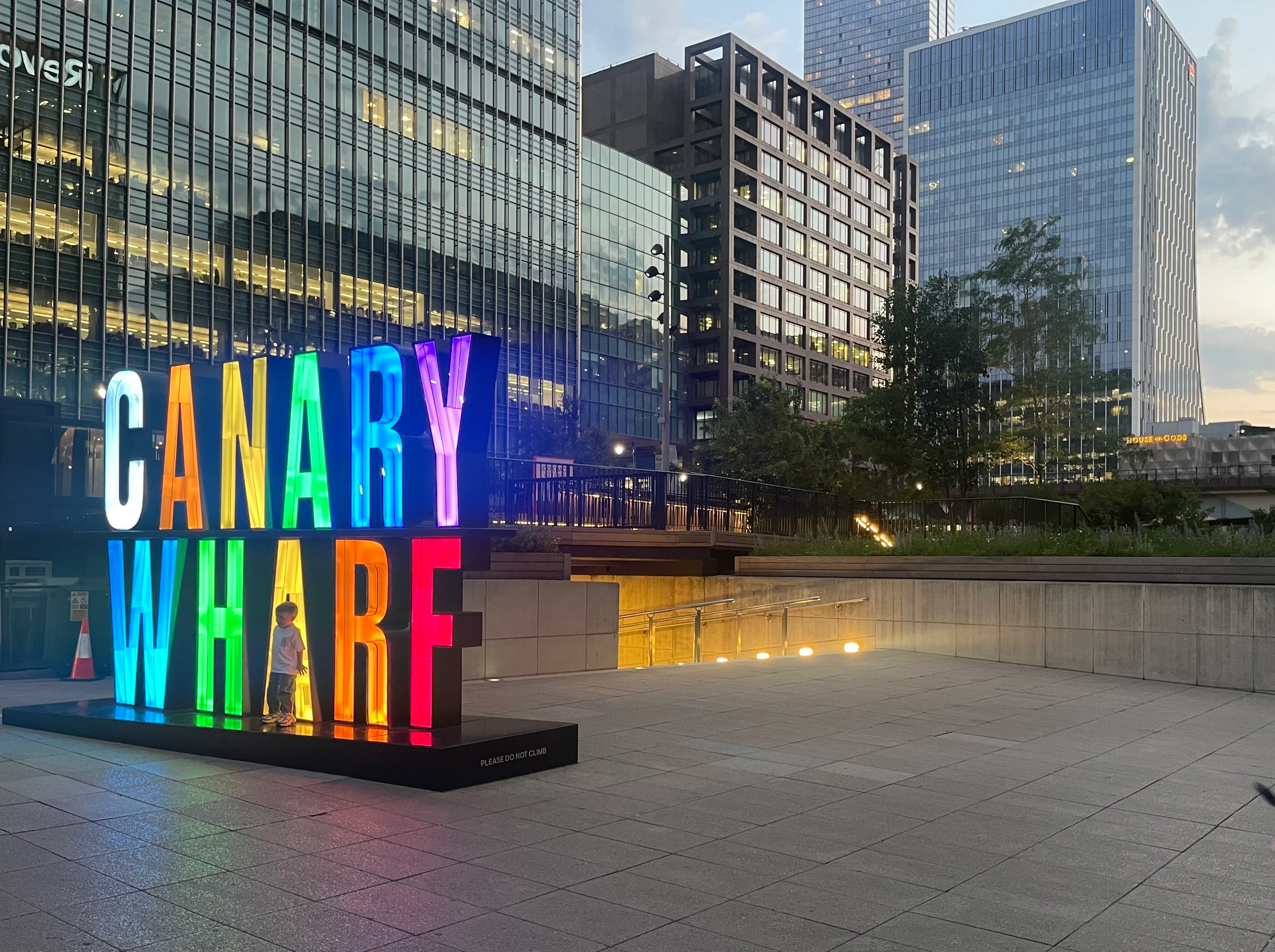 Canary Wharf plaza with House of Gods Hotel in the distance